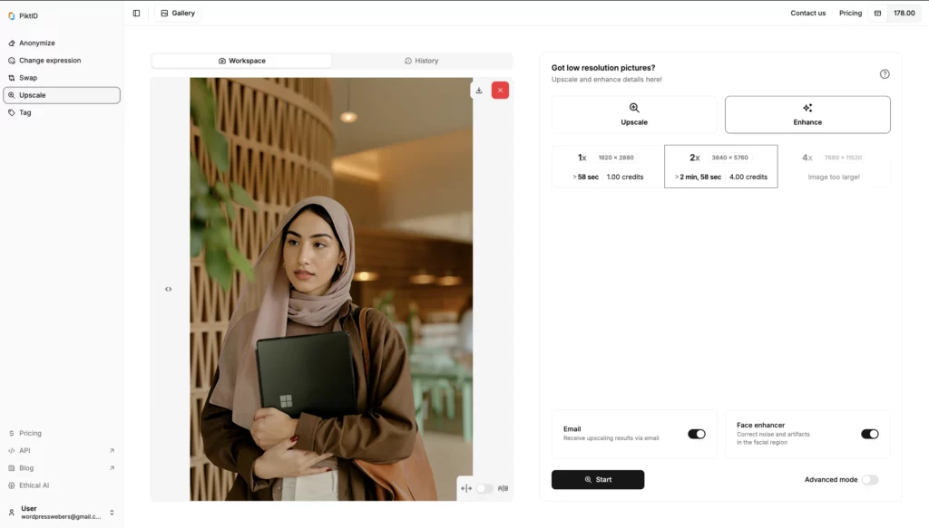 Final enhanced image of a woman in pink scarf after using SuperID's enhance feature