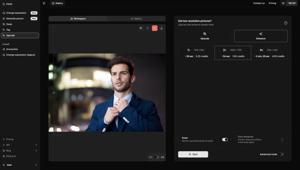 Downloading Upscaled image of a man in blue suit after using Upscale by PiktID